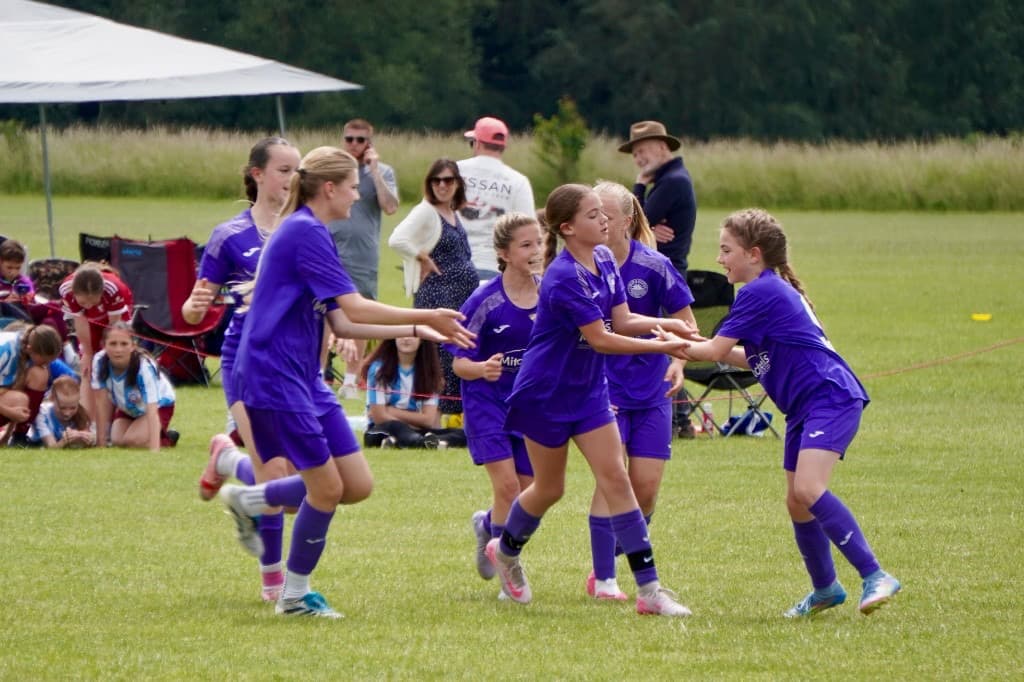 Player kicking the ball during a match at ACES Nationals 2026