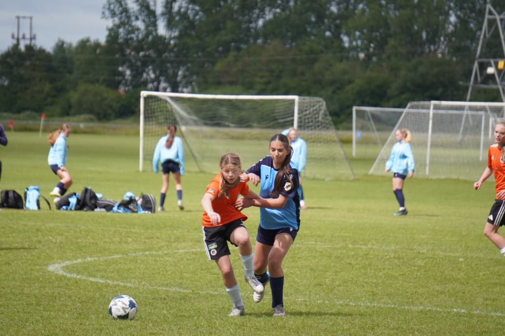 United Football Sporting Girls emerging from Pavilion A at ACES Nationals 2026