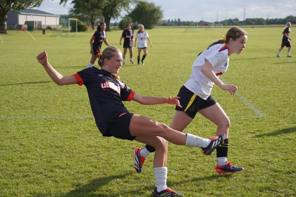 Player mid-kick during a sunny match at ACES Nationals 2026